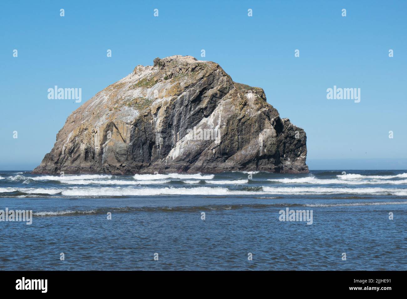 A large rock that looks like a woman's face, at Face Rock Beach in ...