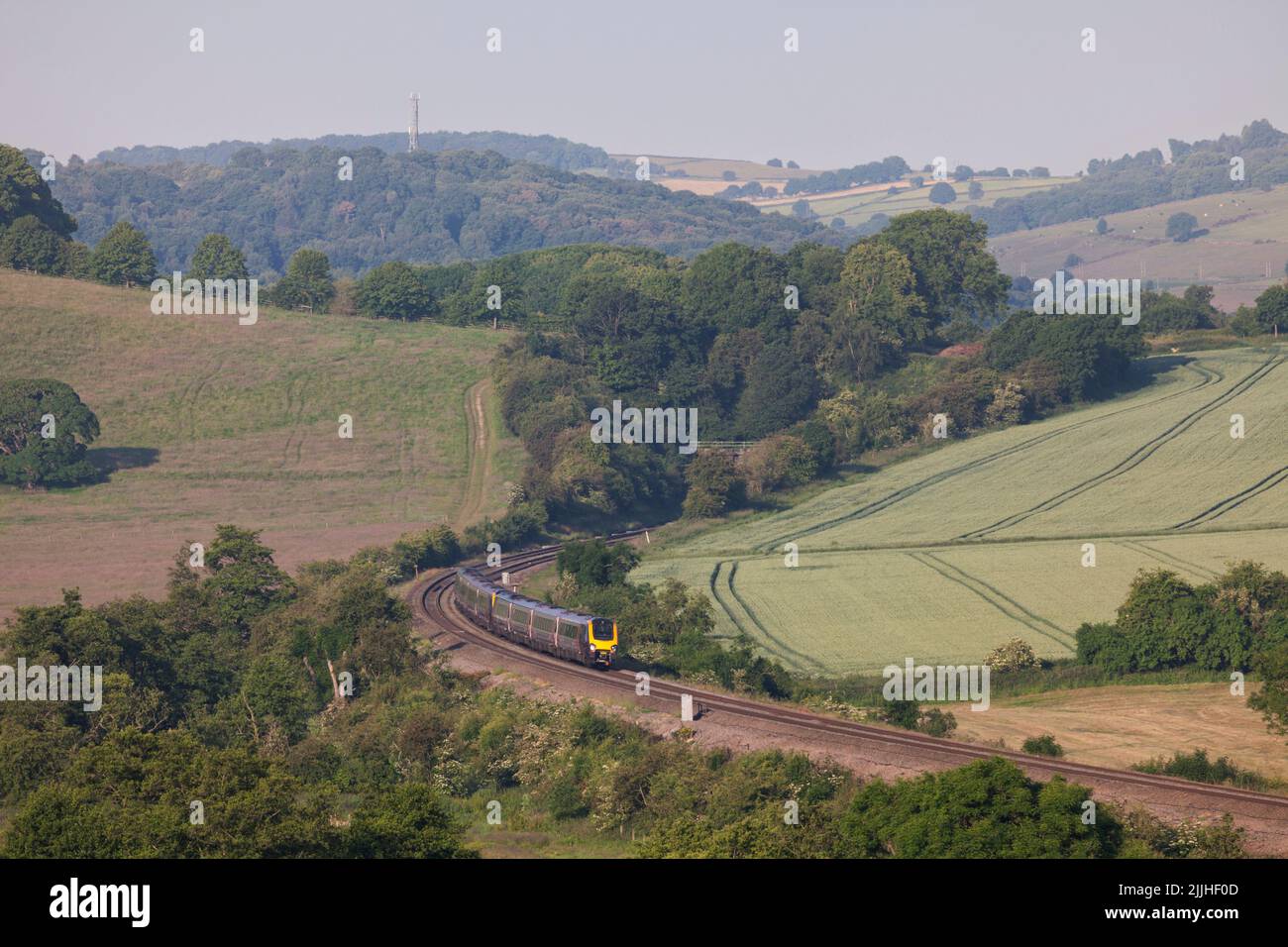 Crosscountry voyager trains passing  Wingfield Park Derbyshire in the countryside on the Midland mainline Stock Photo