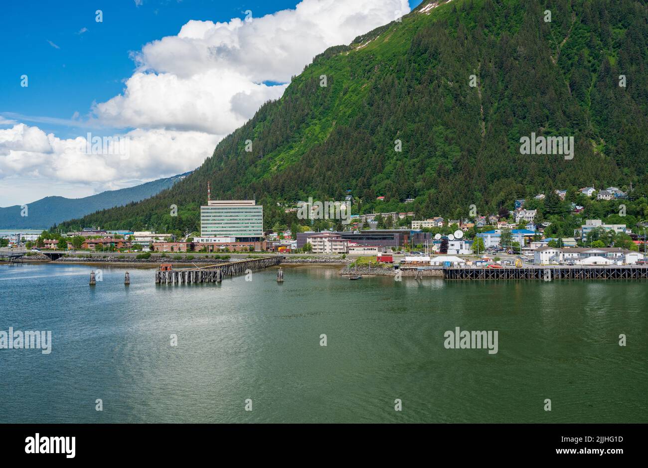 Juneau, AK - 9 June 2022: View of the port of Juneau in Alaska from the water of the harbor Stock Photo