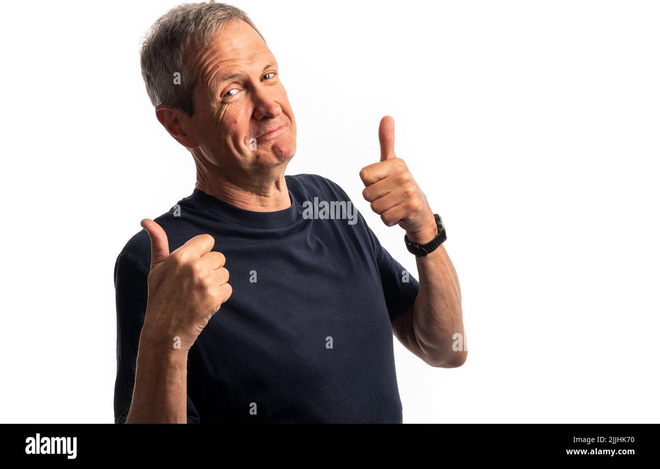 A mature man smiling with a positive attitude isolated on a white background with copy space Stock Photo