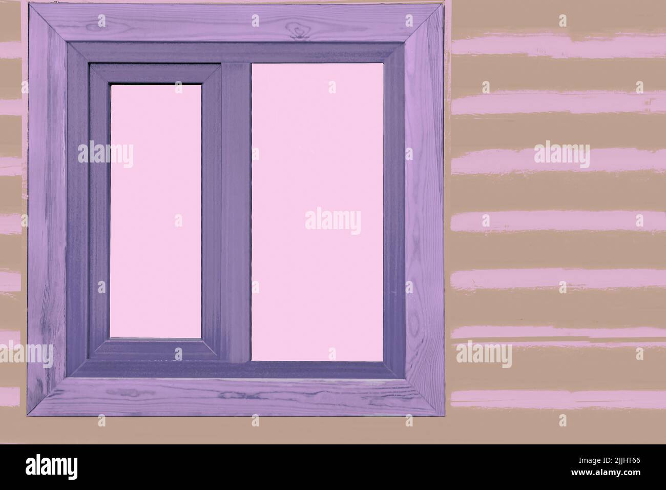 Pink window in a wooden lilac frame in a wooden wall of pink brown logs timbers. Stock Photo