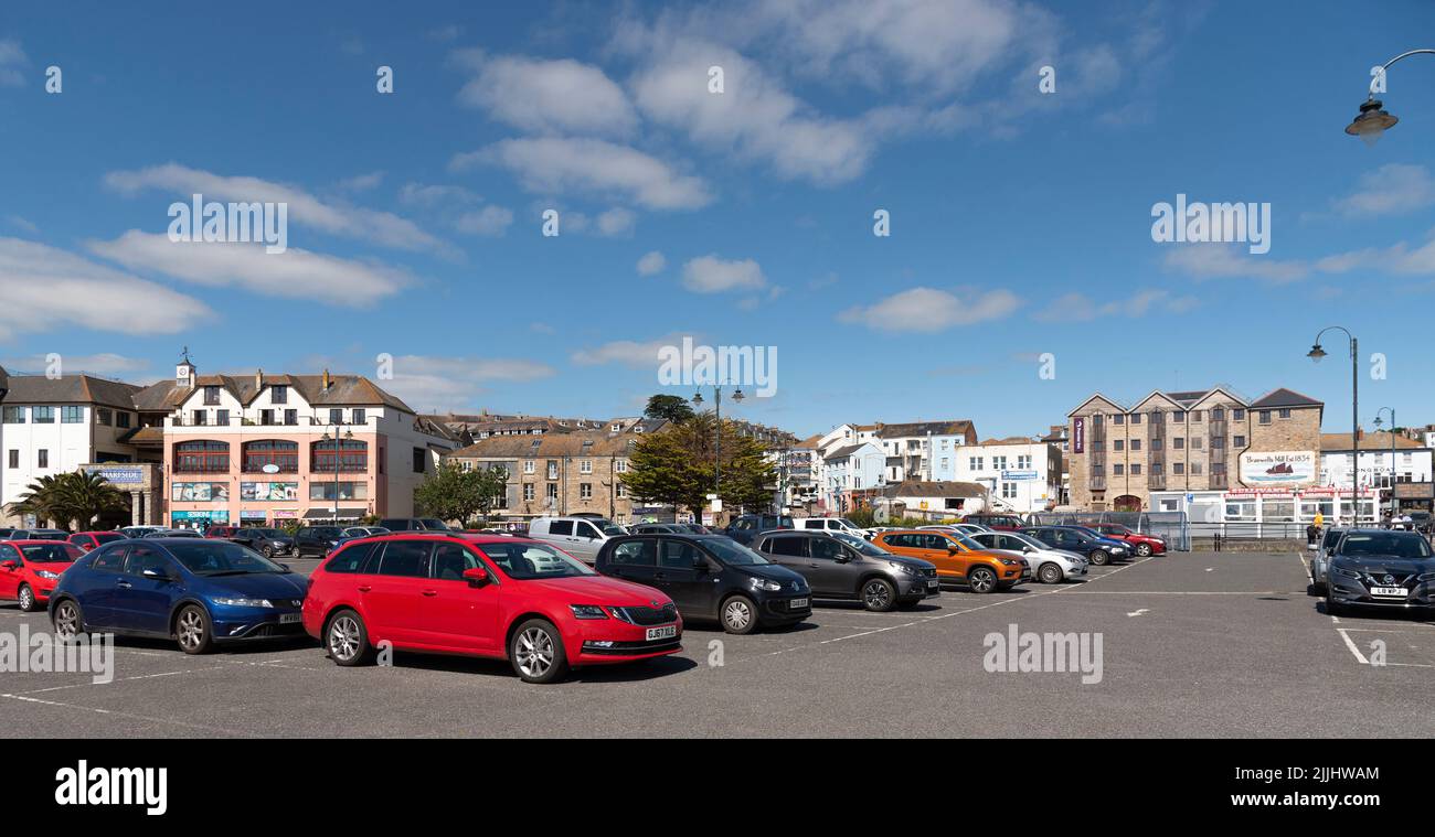 Penzance, Cornwall, England, UK. 2022. Car parking area at the bus station and railway station with backdrop of Penzance town centre.. UK Stock Photo