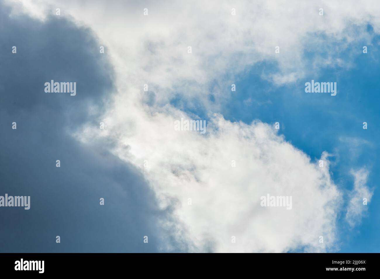 Clouds blue sky weather change bad weather rain clouds background nature. Stock Photo