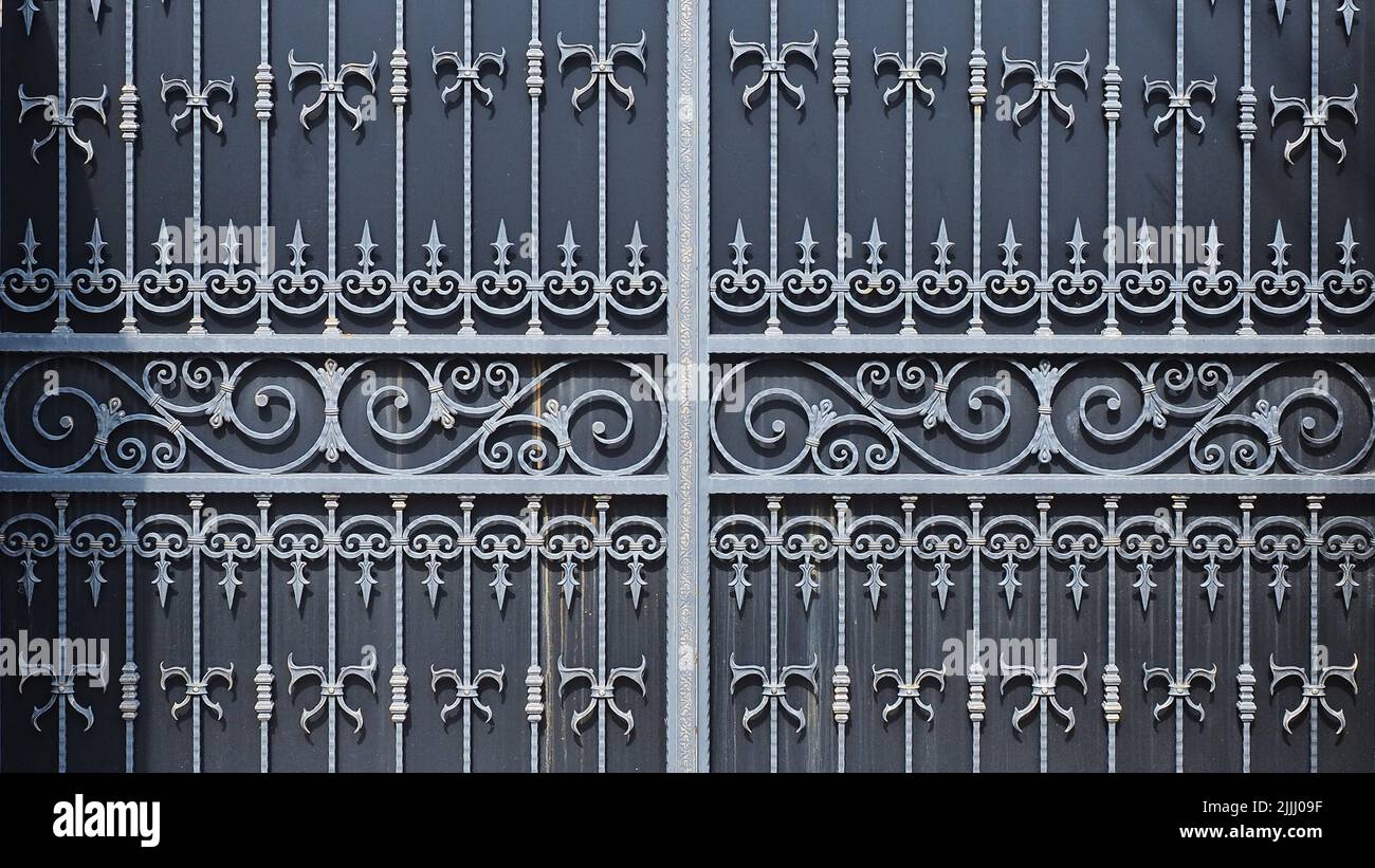 Forged patterned lattice with monograms and spades on massive gate ...