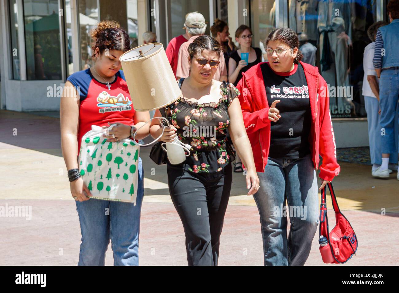 Miami Beach Florida,Lincoln Road pedestrian mall shopping shoppers,Hispanic Latin Latino woman,carrying lamp teen teenage teens teenagers girl girls Stock Photo