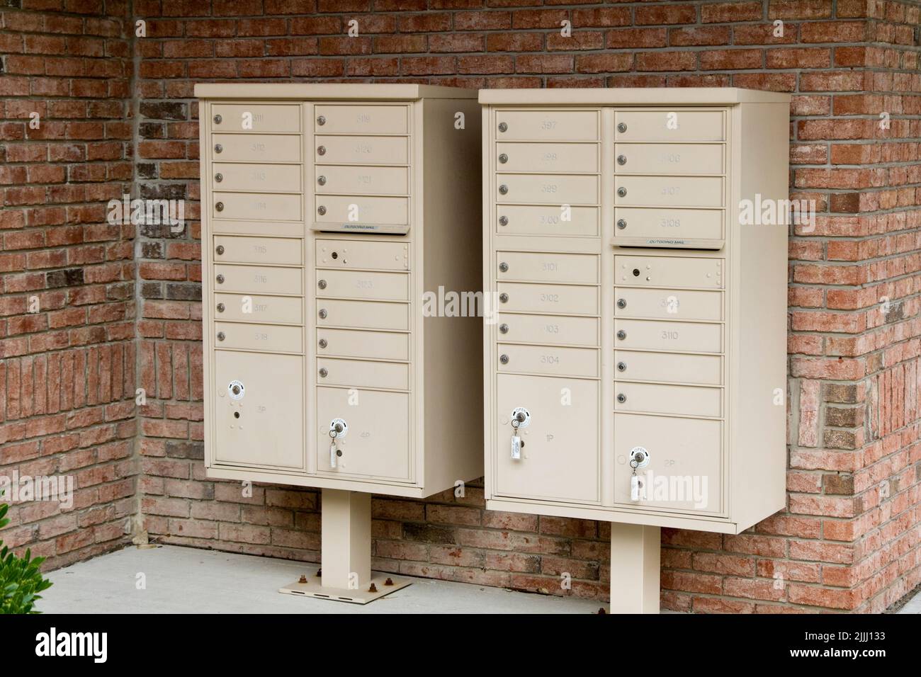Apartment mail boxes at entrance of high rise building. Stock Photo