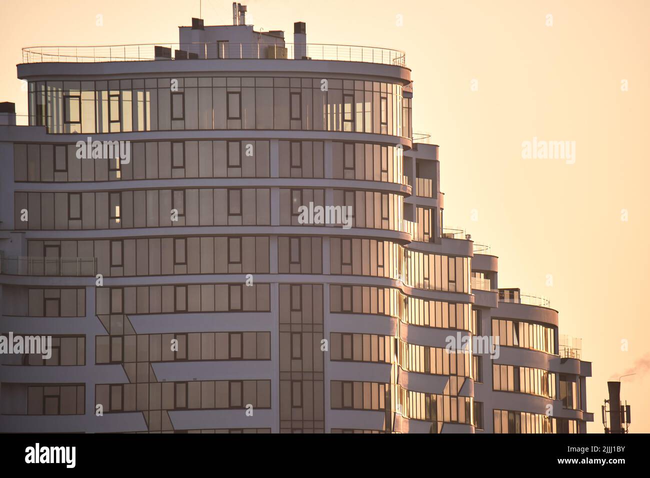 Architectural details of modern high apartment building facade with ...