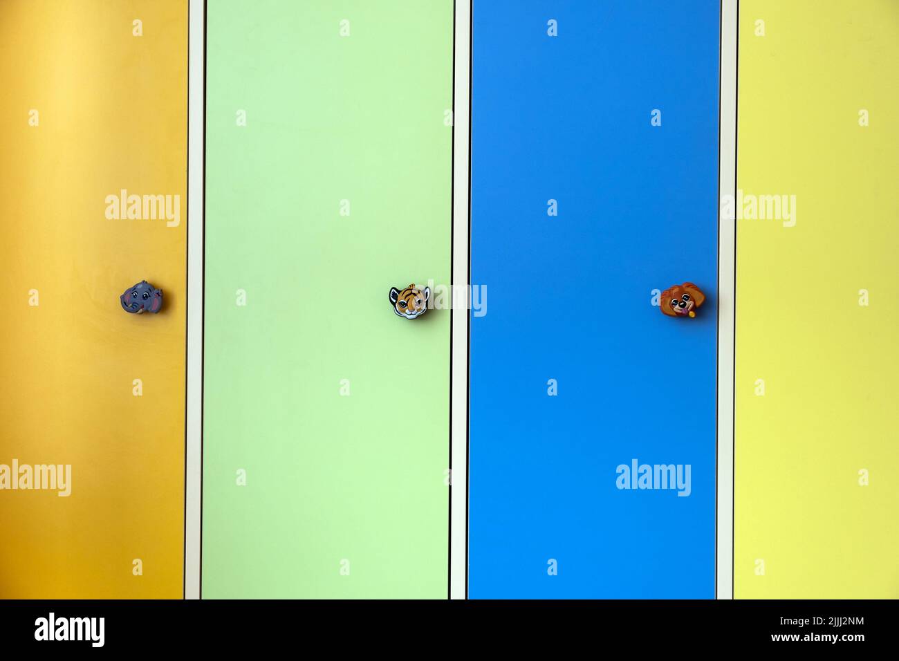 Close up of colorful lockers doors with funny animals as door knobs in ...