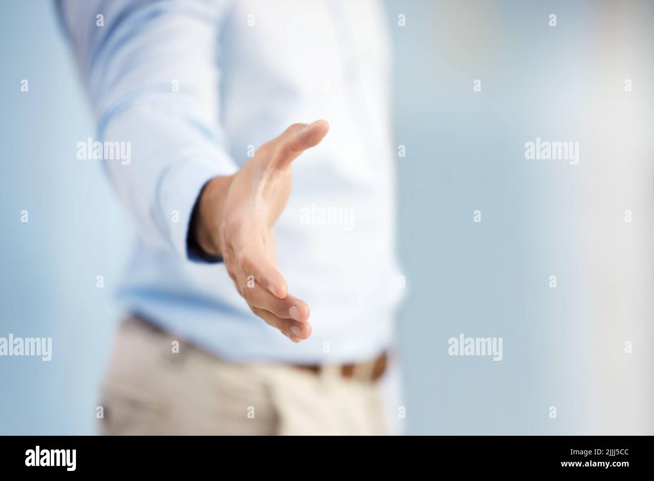 Weve been waiting for you. a businessman ready to shake hands in ...