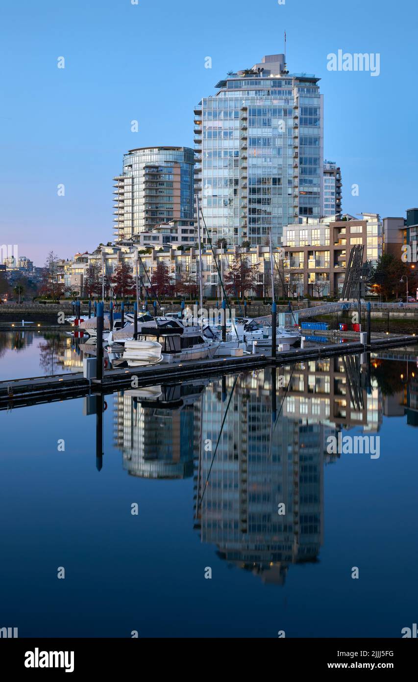 Vancouver, British Columbia, Canada – November 18, 2018. Yaletown Marina and Towers Sunrise. Morning sun reflects off Yaletown condominiums in downtow Stock Photo