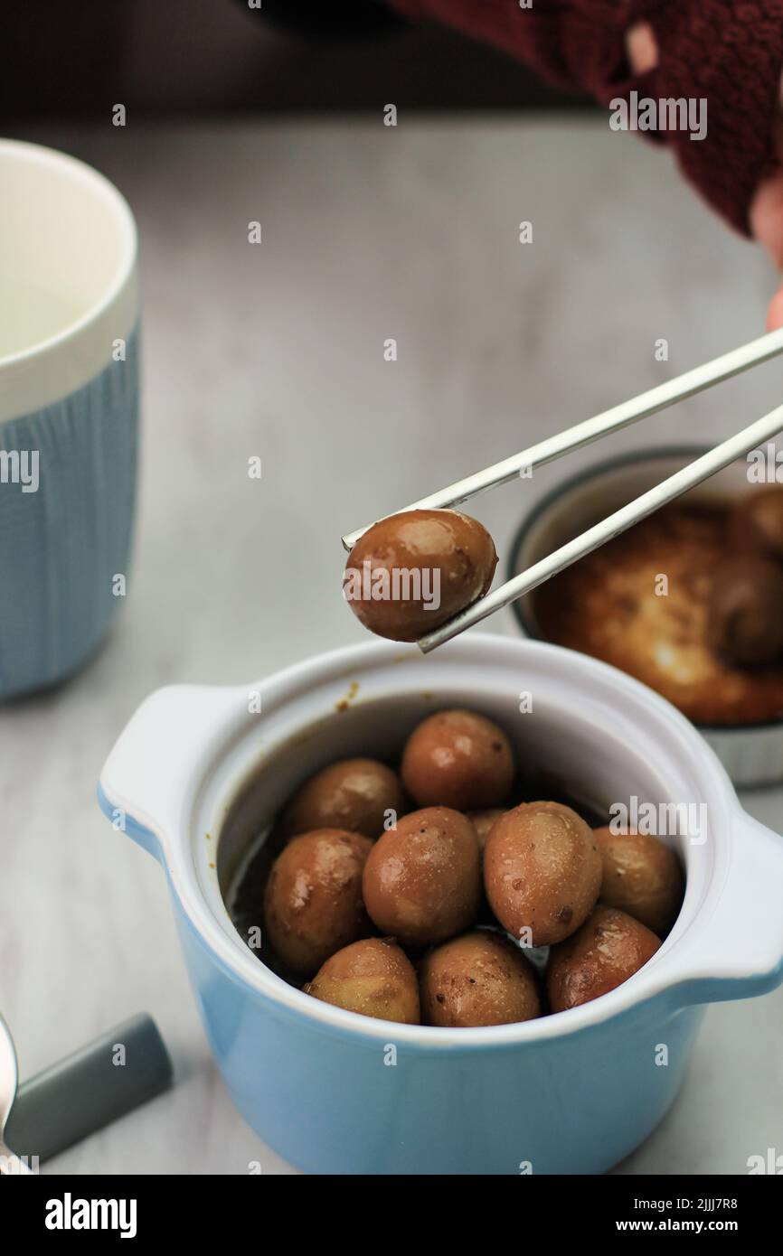 Pick Brown Quail Egg (Semur Telur Puyuh) with Chopstick, Banchan Side