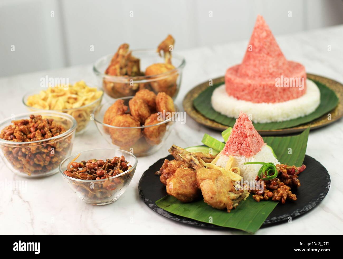 Red and White  Rice Called Nasi Tumpeng Same as Indonesian National Flag for Independence Day Celebration at 17 August Stock Photo