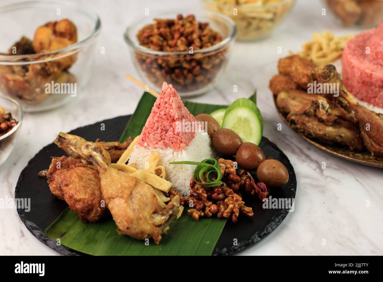 Red and White  Rice Called Nasi Tumpeng Same as Indonesian National Flag for Independence Day Celebration at 17 August Stock Photo