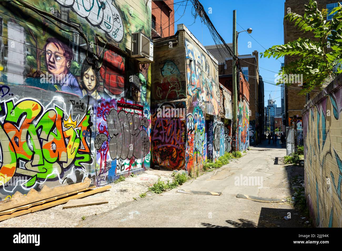 TORONTO, CANADA JUNE 18, 2022 Part of Graffiti Alley (Rush Lane) in