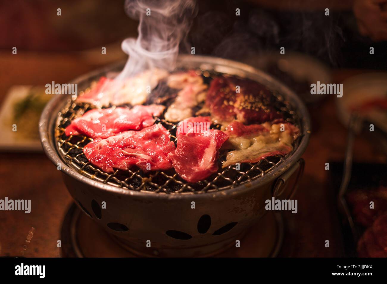 Grilling wagyu beef on charcoal grill ,Japanese barbecue roaster Stock