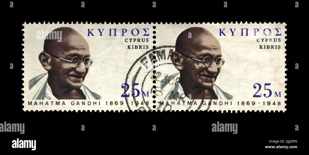 Mahatma Gandhi (1869-1948) aka Mohandas Karamchand Gandhi, famous indian activist, canceled stamp printed in Cyprus Stock Photo