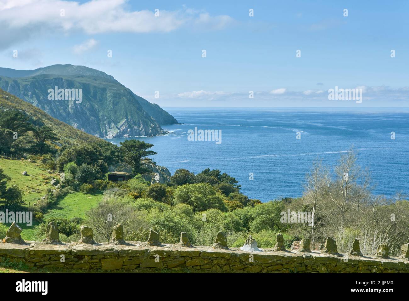 A landscape scene of Vixia Herbeira green cliff by water in Santo Andre de Teixido in Galicia Stock Photo