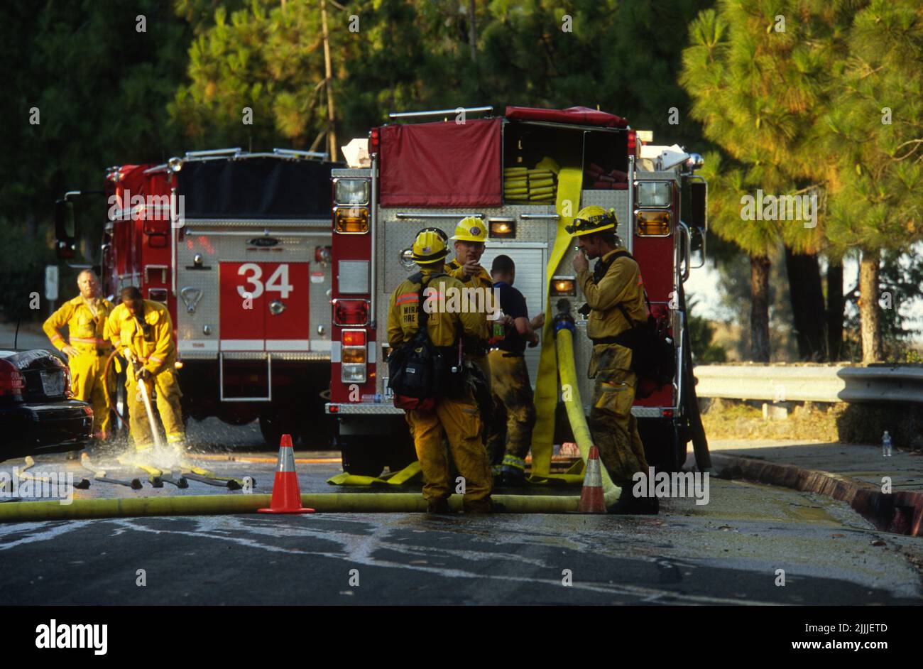 Fire crews cleaning gear after a Mission Gorge brush fire Stock Photo