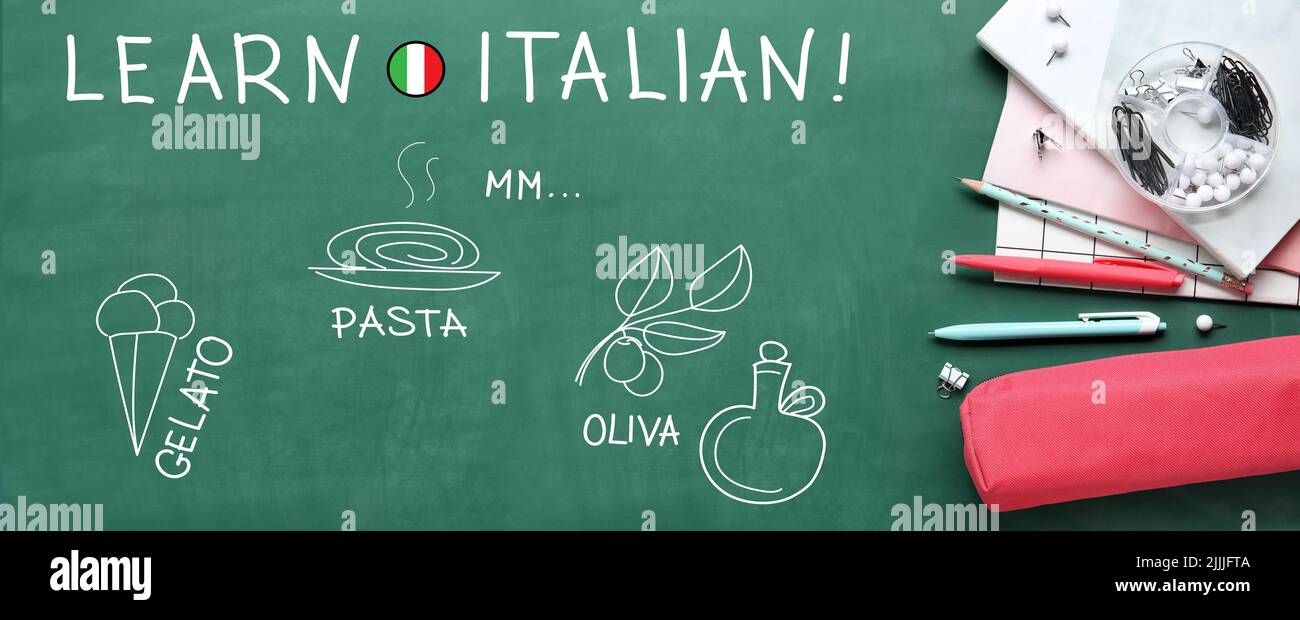 Stationery and text LEARN ITALIAN on school blackboard Stock Photo Alamy