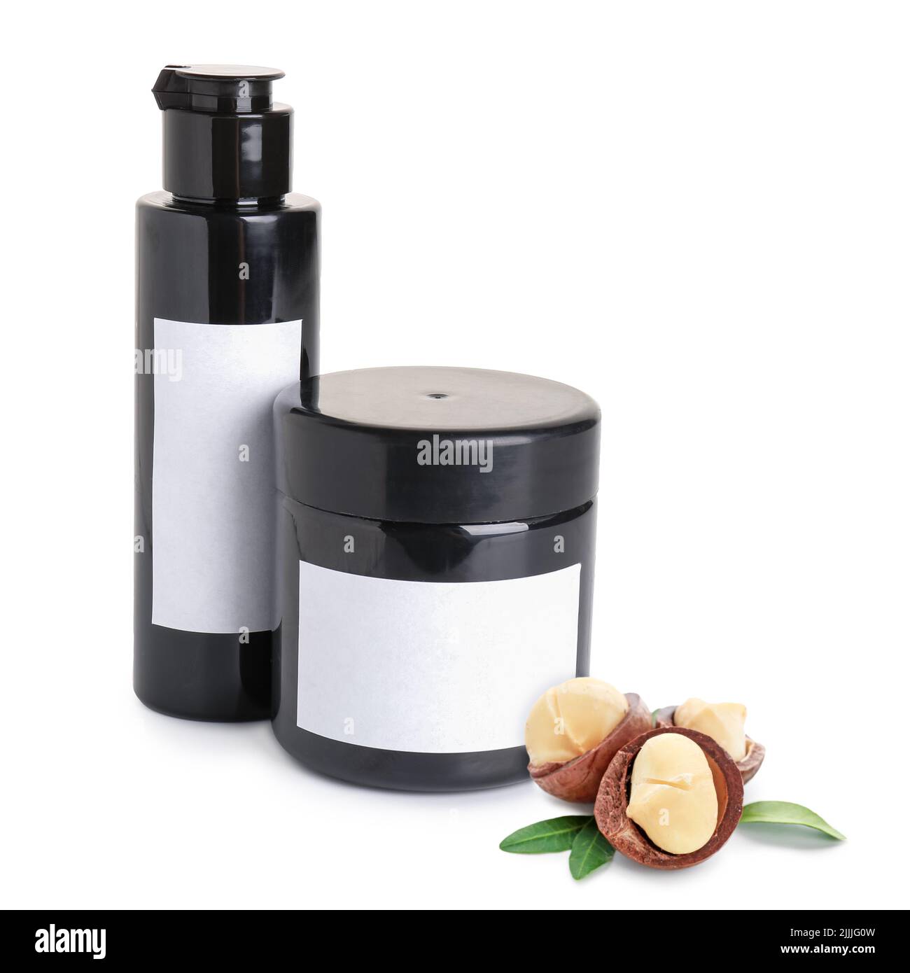 Natural cosmetics with macadamia nuts on white background Stock Photo