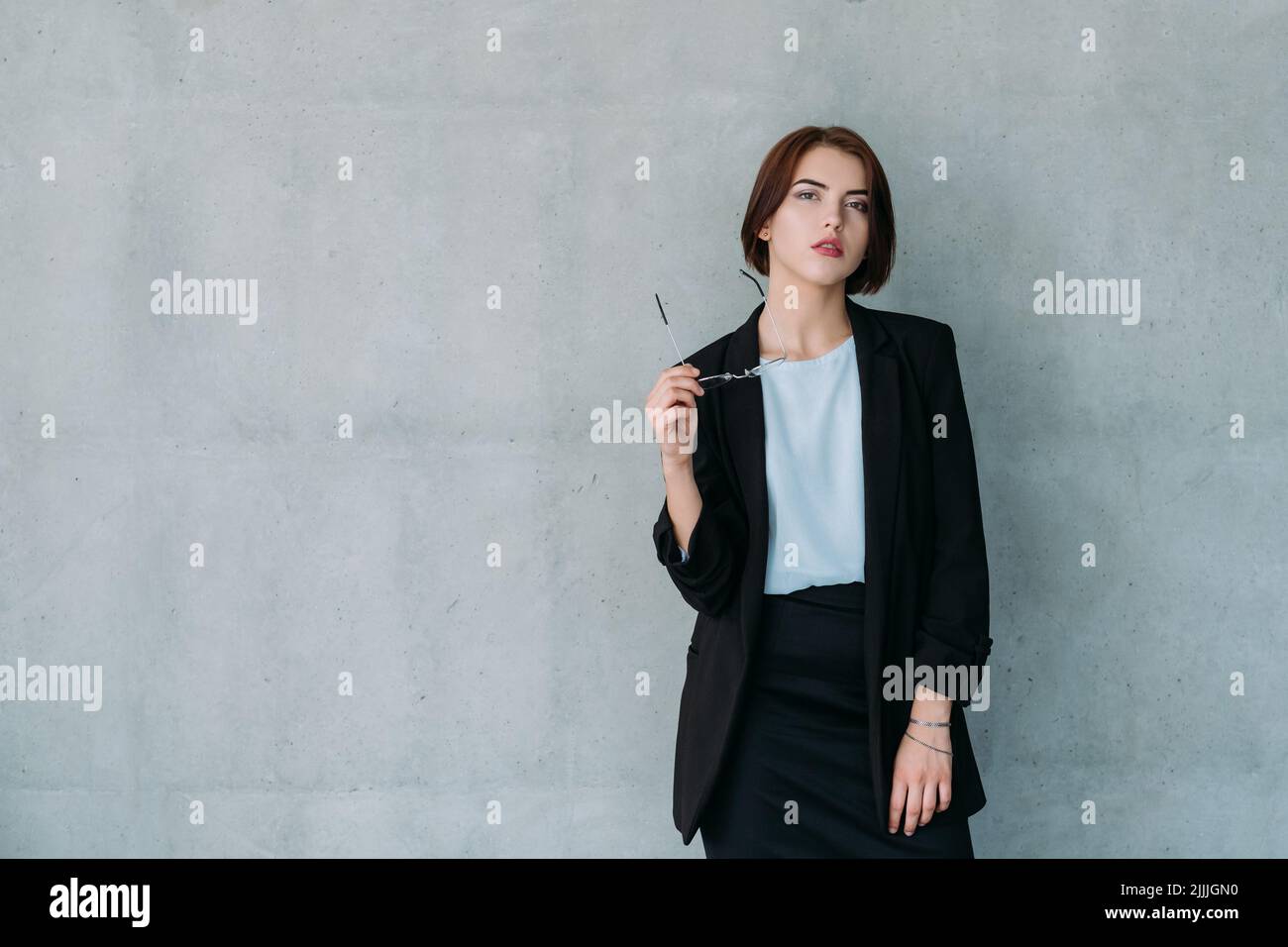 confident business analyst skepticism female Stock Photo