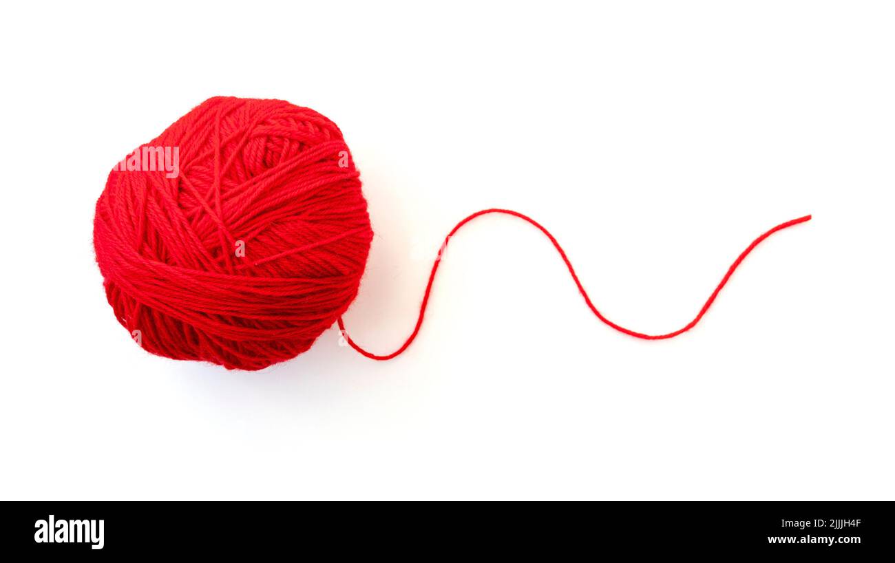 Ball with red yarn and thin rope isolated on white Stock Photo