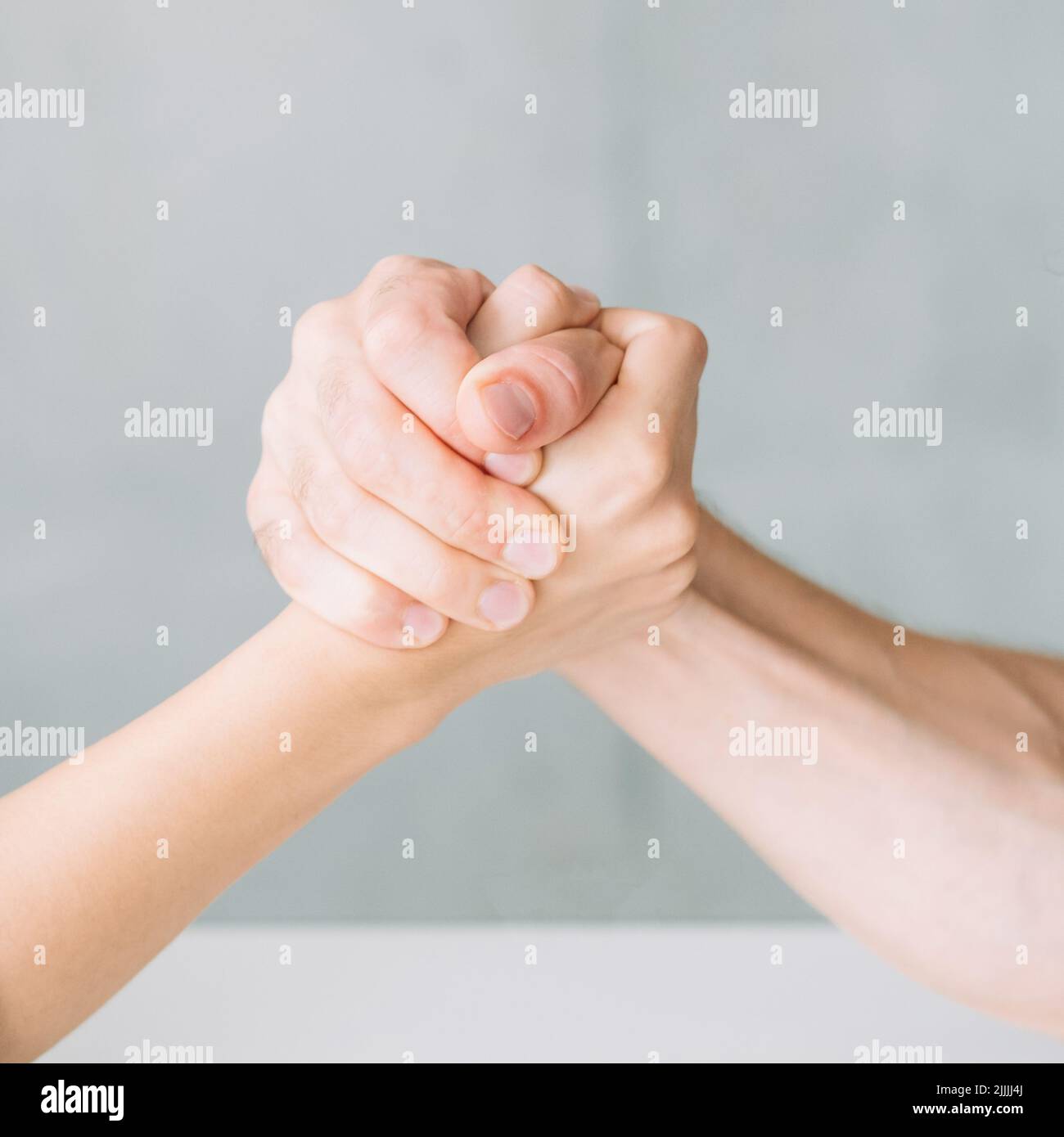 hands arm wrestling competition fight conflict Stock Photo Alamy