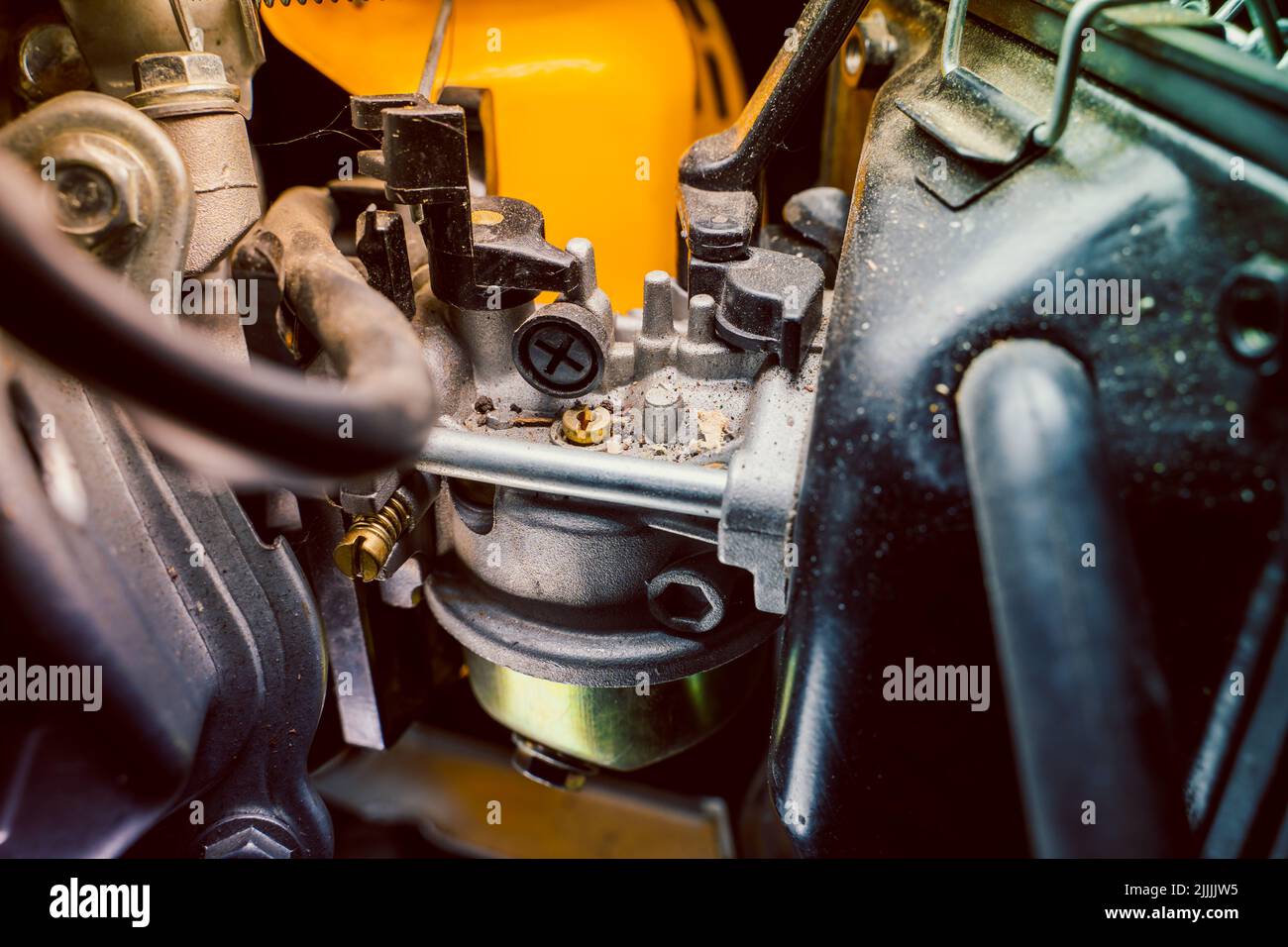 Small carburetor of a gasoline engine of a gasoline electric generator closeup Stock Photo Alamy