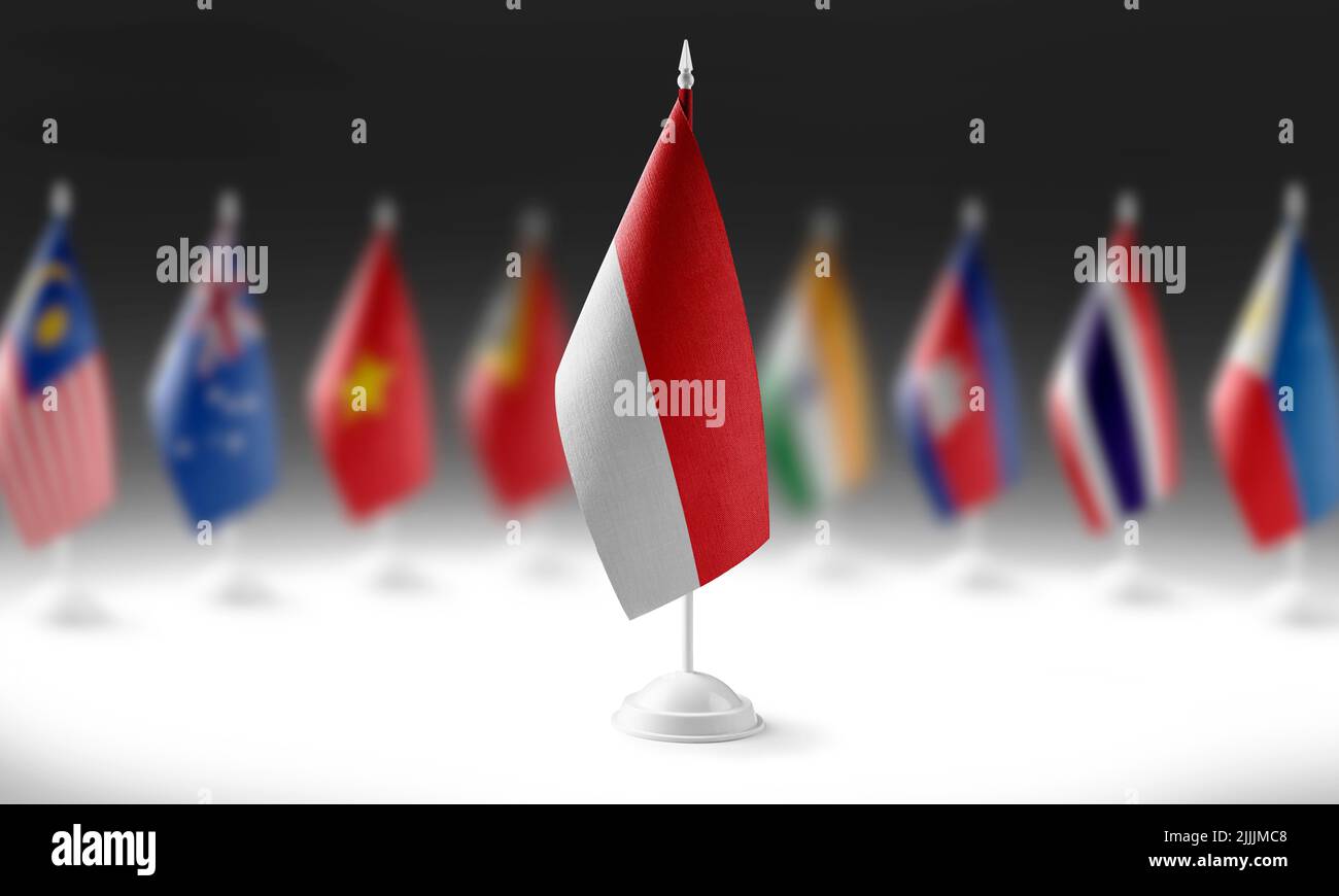 The national flag of the Indonesia on the background of flags of other ...