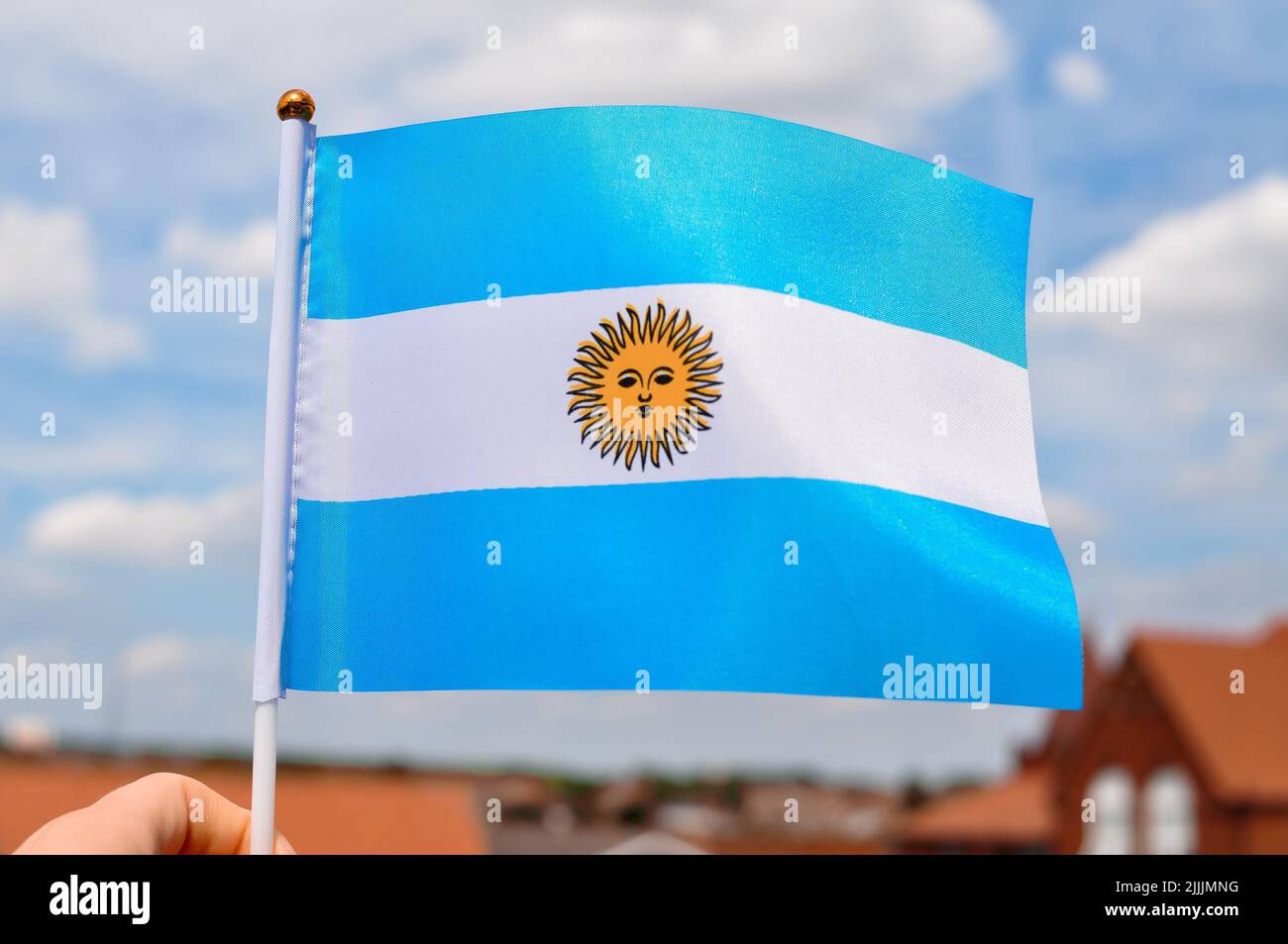 white and blue national flag with sun of Argentina close up Stock Photo Alamy