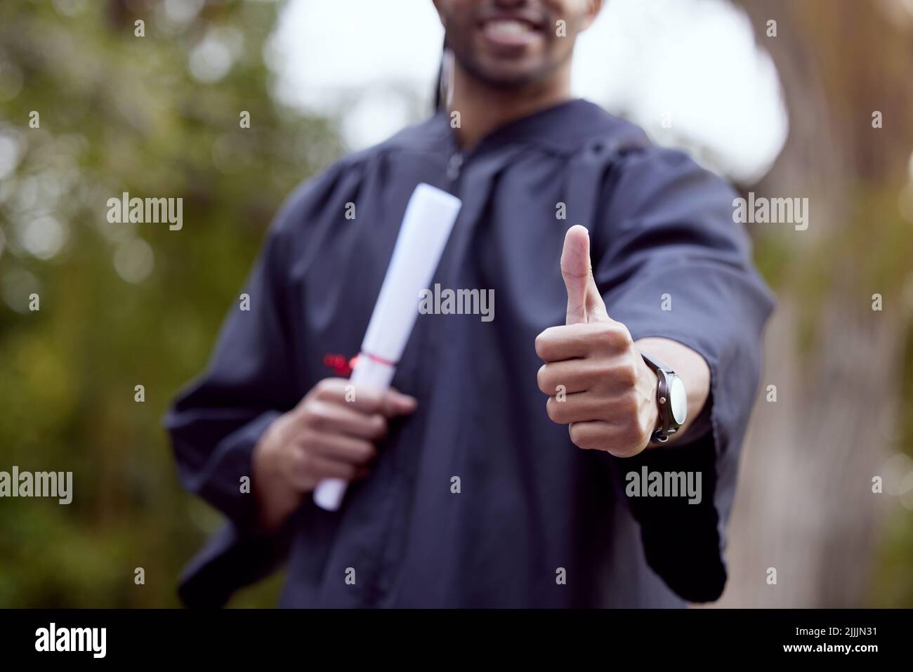 Push through and youll achieve all your dreams. a young man showing ...