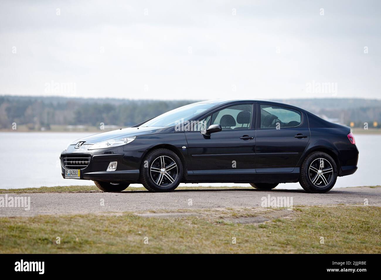 Berlin - April 2014: Peugeot 407 2003-2010 sedan pre facelift side view on  road outdoors with spring landscape background with lake and forest with  Stock Photo - Alamy