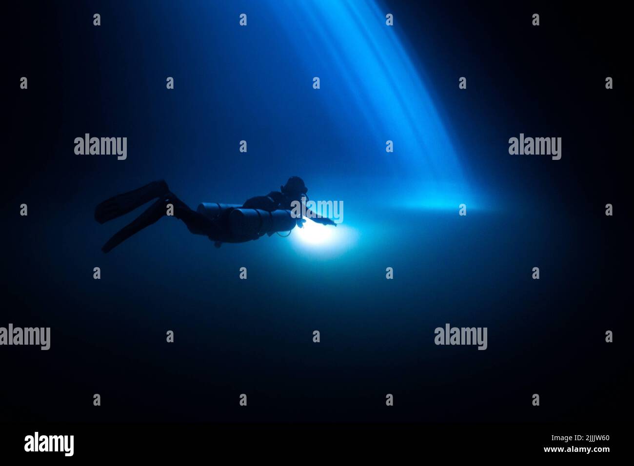 This light forms in the Maravilla cenote. Mexico: THESE HAUNTING images show divers exploring over 200 feet underwater in a mysterious formations fitt Stock Photo