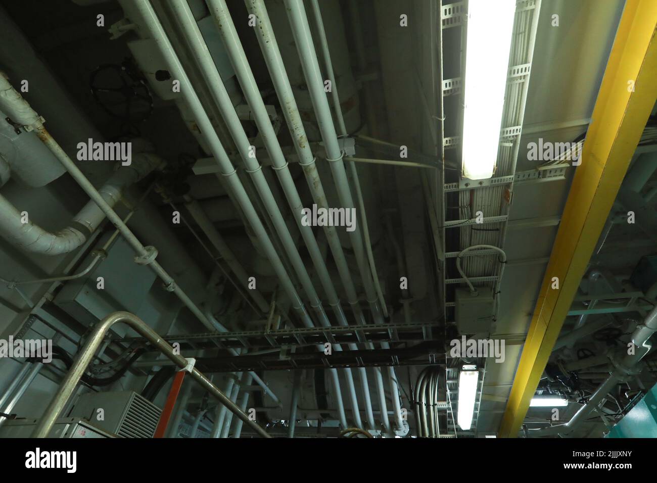Cruise ship engine room interior with water tight doors electrical and