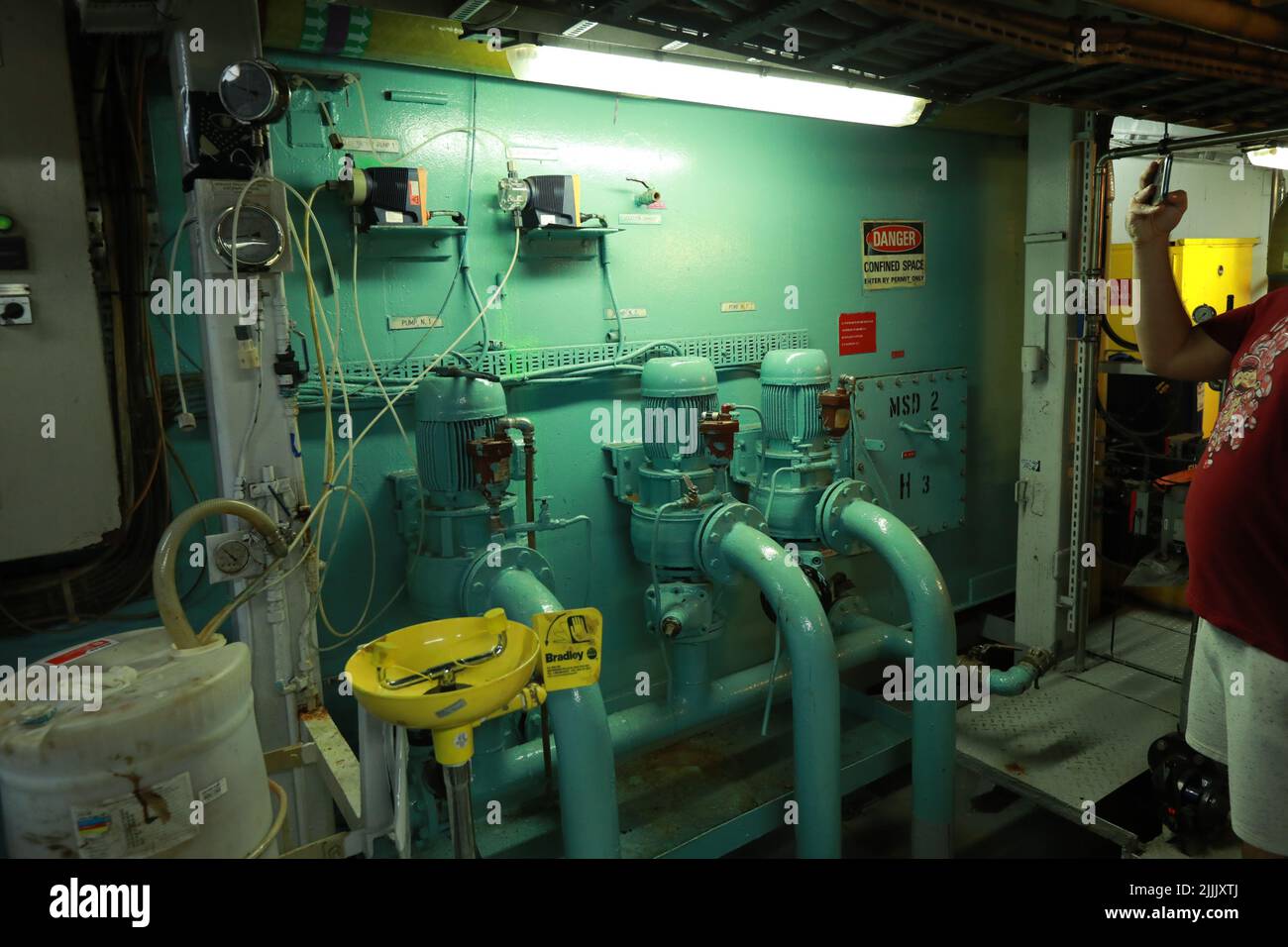 Cruise ship engine room interior with water tight doors electrical and