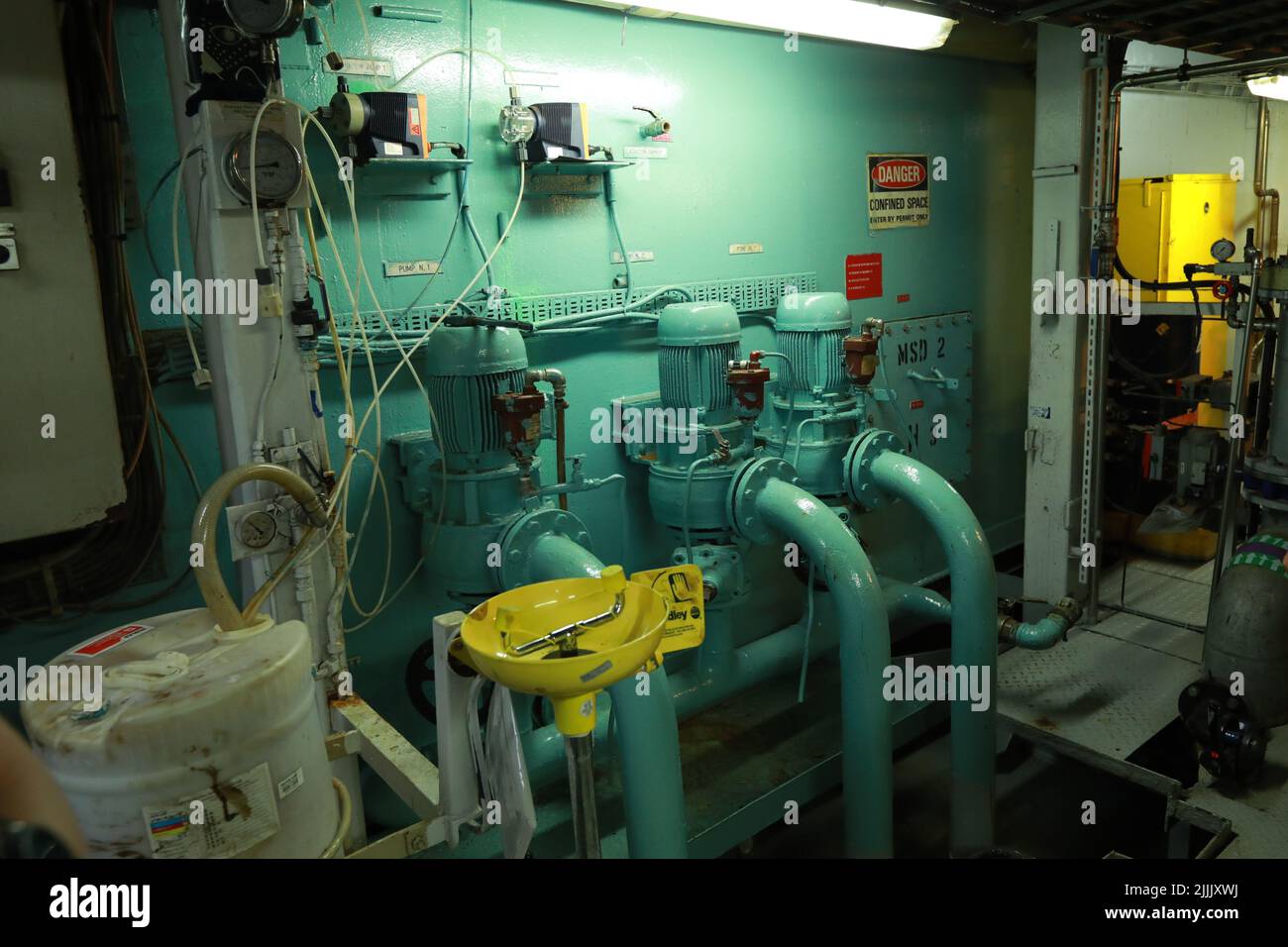 Cruise ship engine room interior with water tight doors electrical and