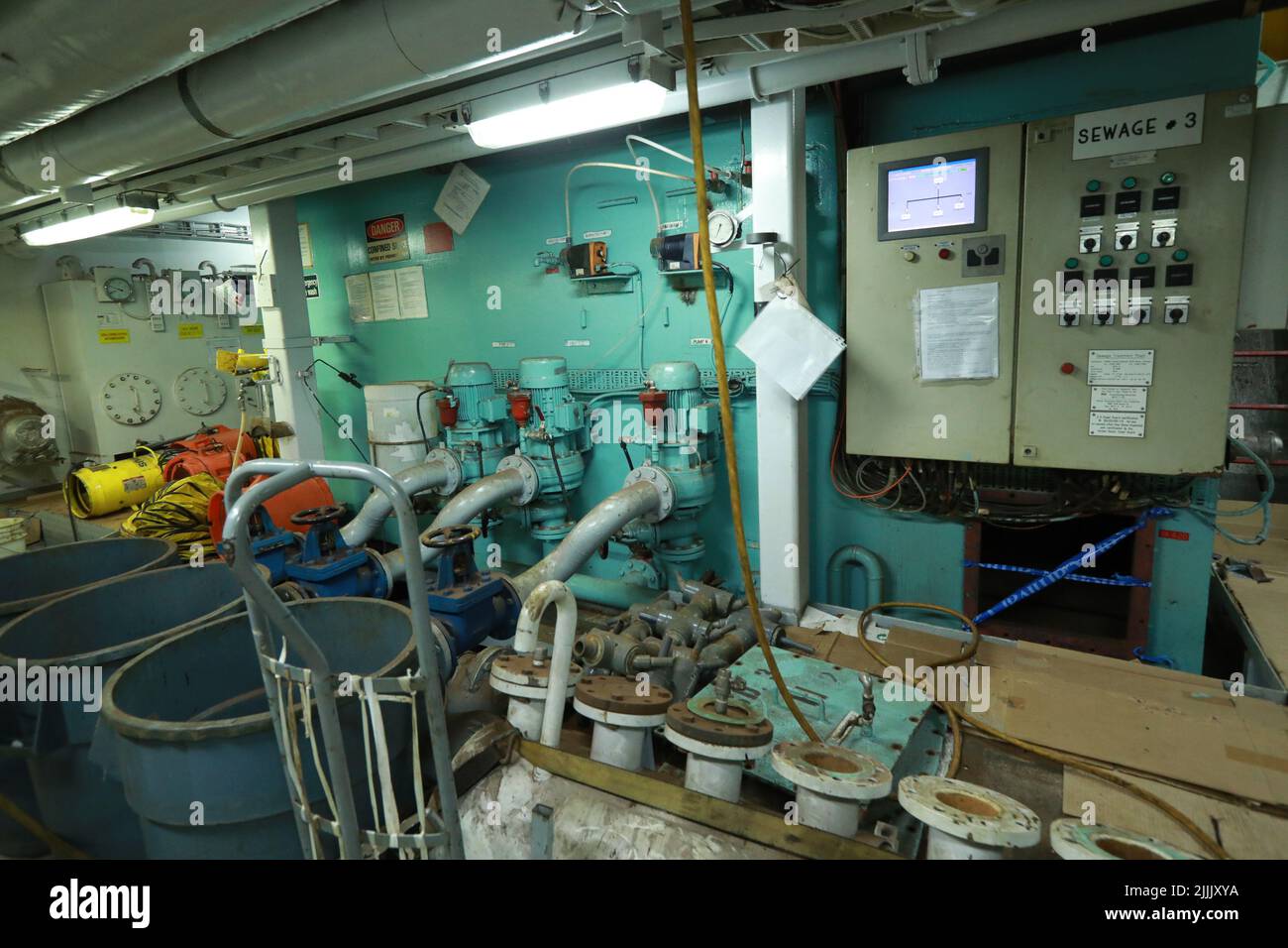 Cruise ship engine room interior with water tight doors electrical and