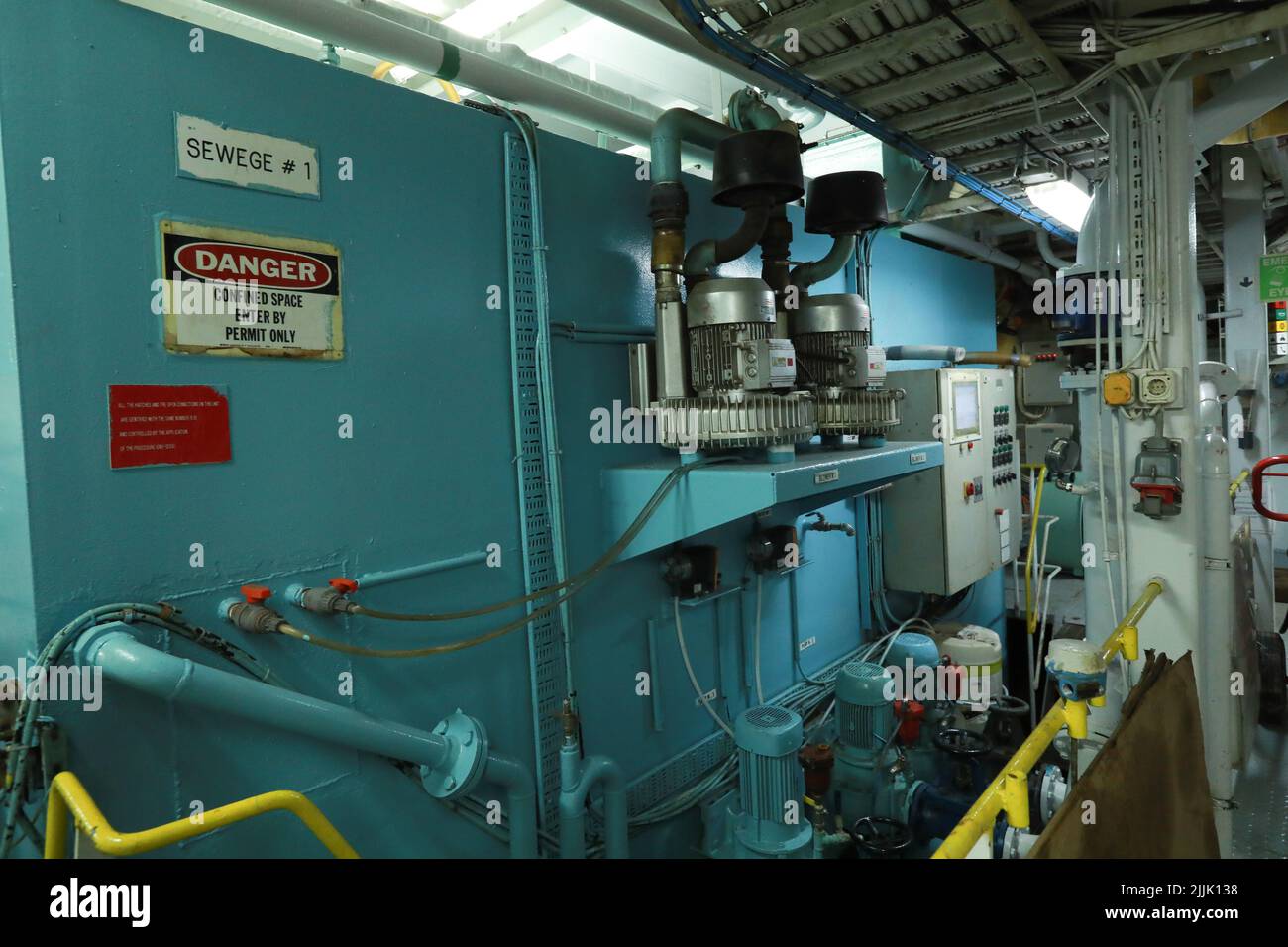 Cruise ship engine room interior with water tight doors electrical and