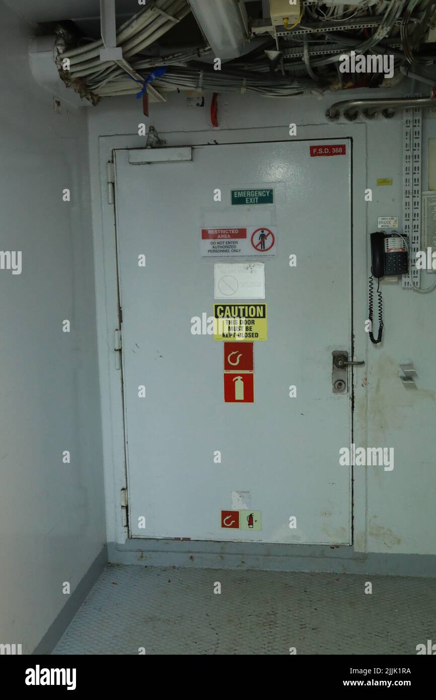 Cruise ship engine room interior with water tight doors electrical and