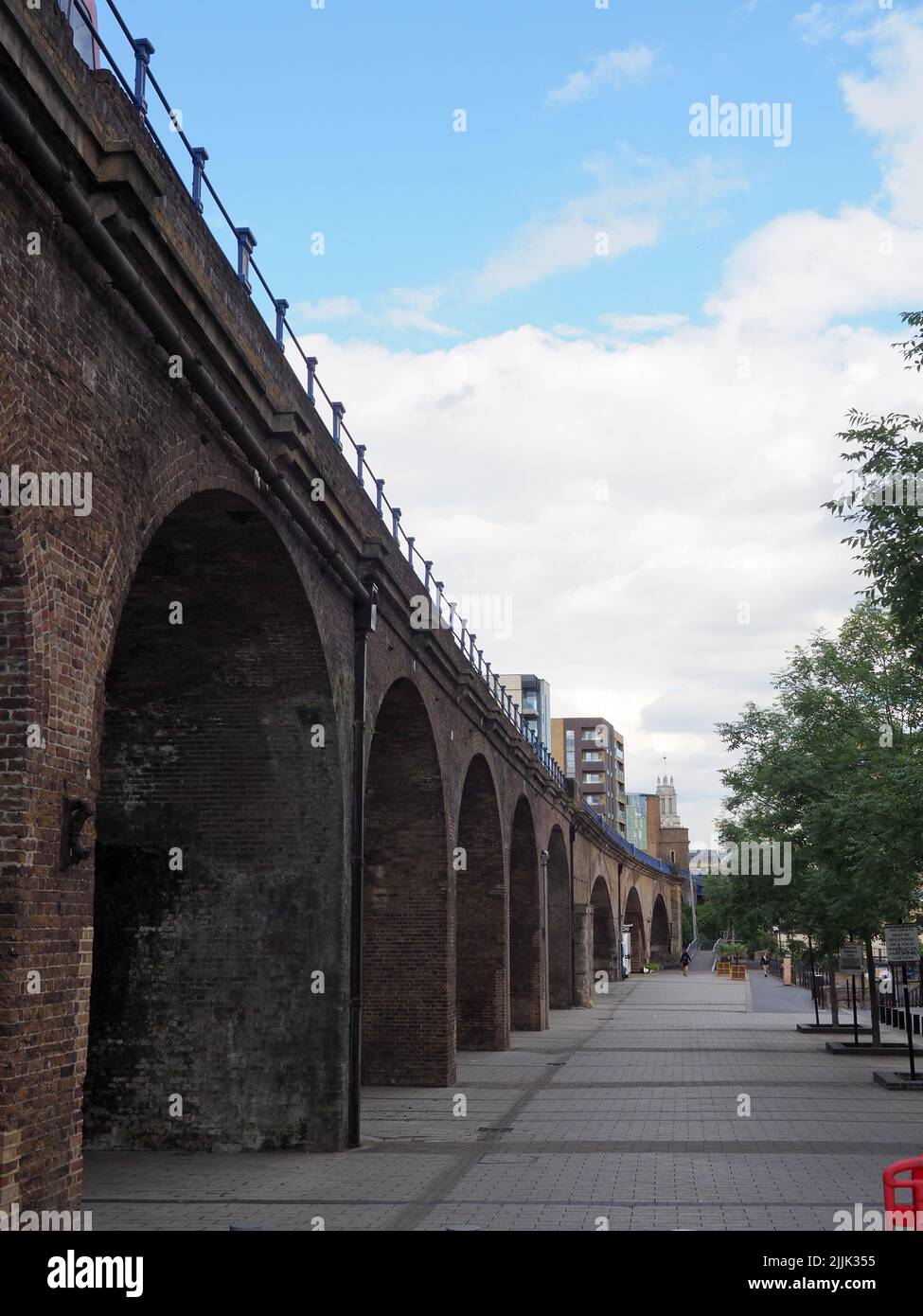 The railway viaduct that carries the Docklands light Railway past Limehouse Marina in London Stock Photo