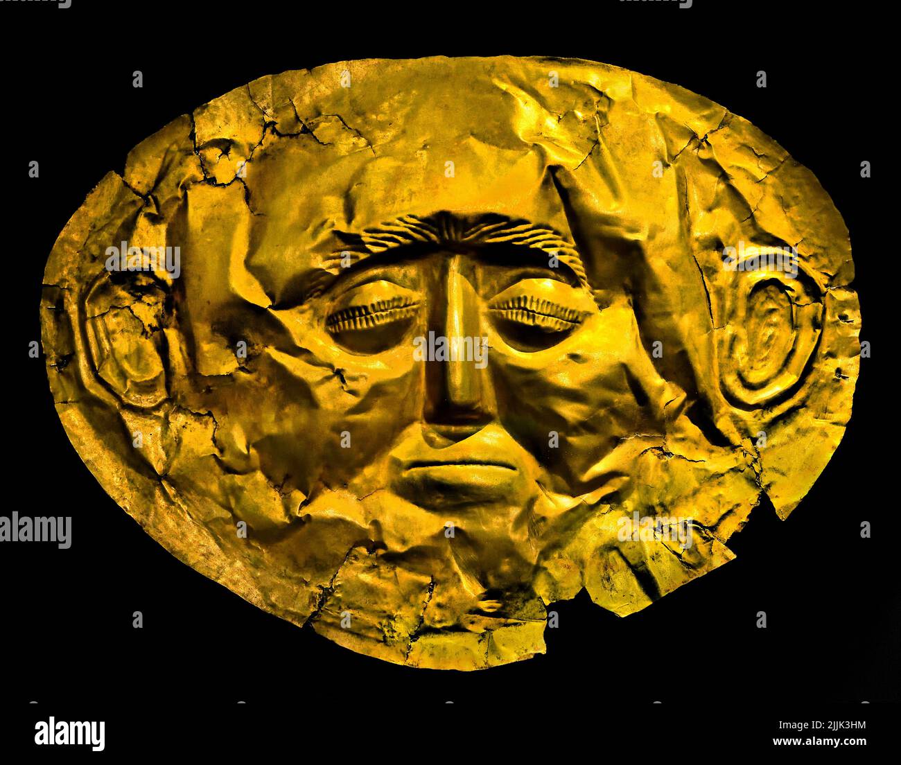 Funerary mask , gold foil embossed, Royal Tombs of Mycenae, Mycenaean gold death mask, Grave Circle A, Mycenae, Mycenaean Greece , Mycenaean civilization, Bronze Age in Ancient Greece 1750 to 1050 BC, Mycenae, National Archaeological Museum in Athens. Stock Photo