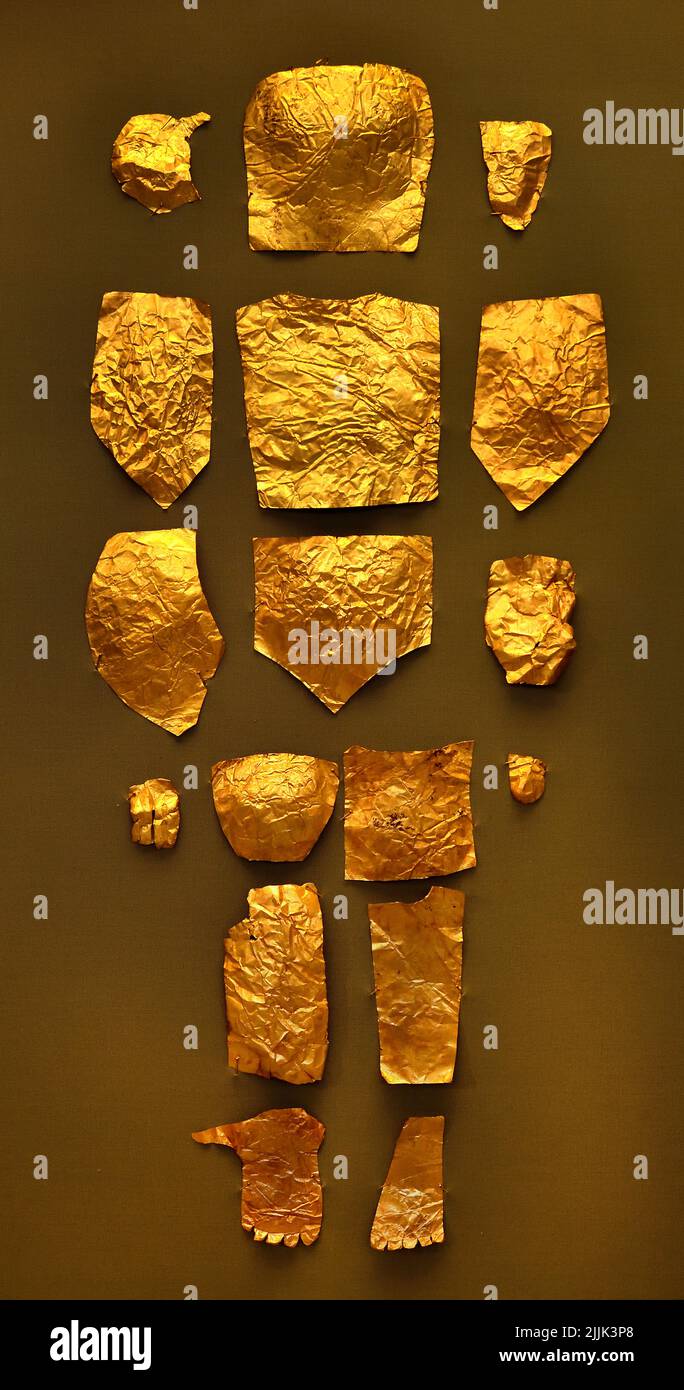 Body shaped Mycenaean gold cut outs from Grave III, 'Grave of a Women', Grave Circle A Gold elliptical funeral diadems from Shaft Grave III  Mycenaean Greece , Mycenaean civilization, Bronze Age in Ancient Greece 1750 to 1050 BC, Mycenae, National Archaeological Museum in Athens.Mycenaean Greece , Mycenaean civilization, Bronze Age in Ancient Greece 1750 to 1050 BC, Mycenae, National Archaeological Museum in Athens. Stock Photo