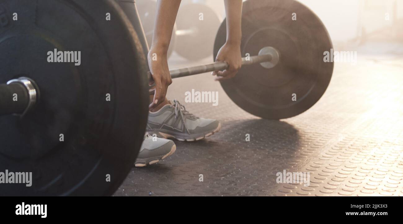 Deadlifts target fullbody activation. Closeup shot of an