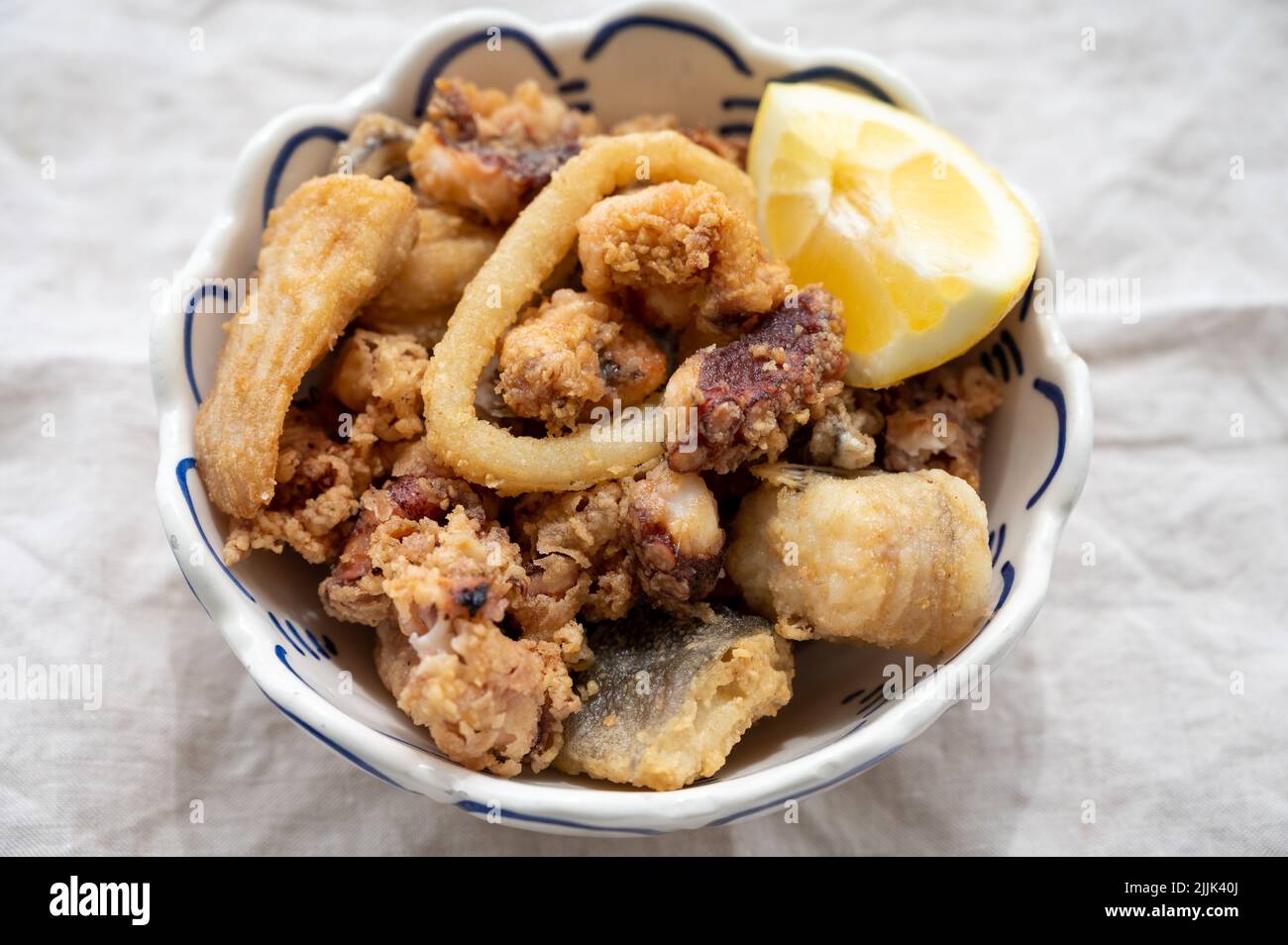 Spanish sea food, cripsy deep fried baby octopus, fish, calamari rings