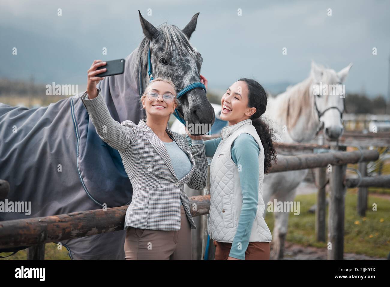 fun-of-a-different-kind-two-beautiful-young-women-taking-a-selfie