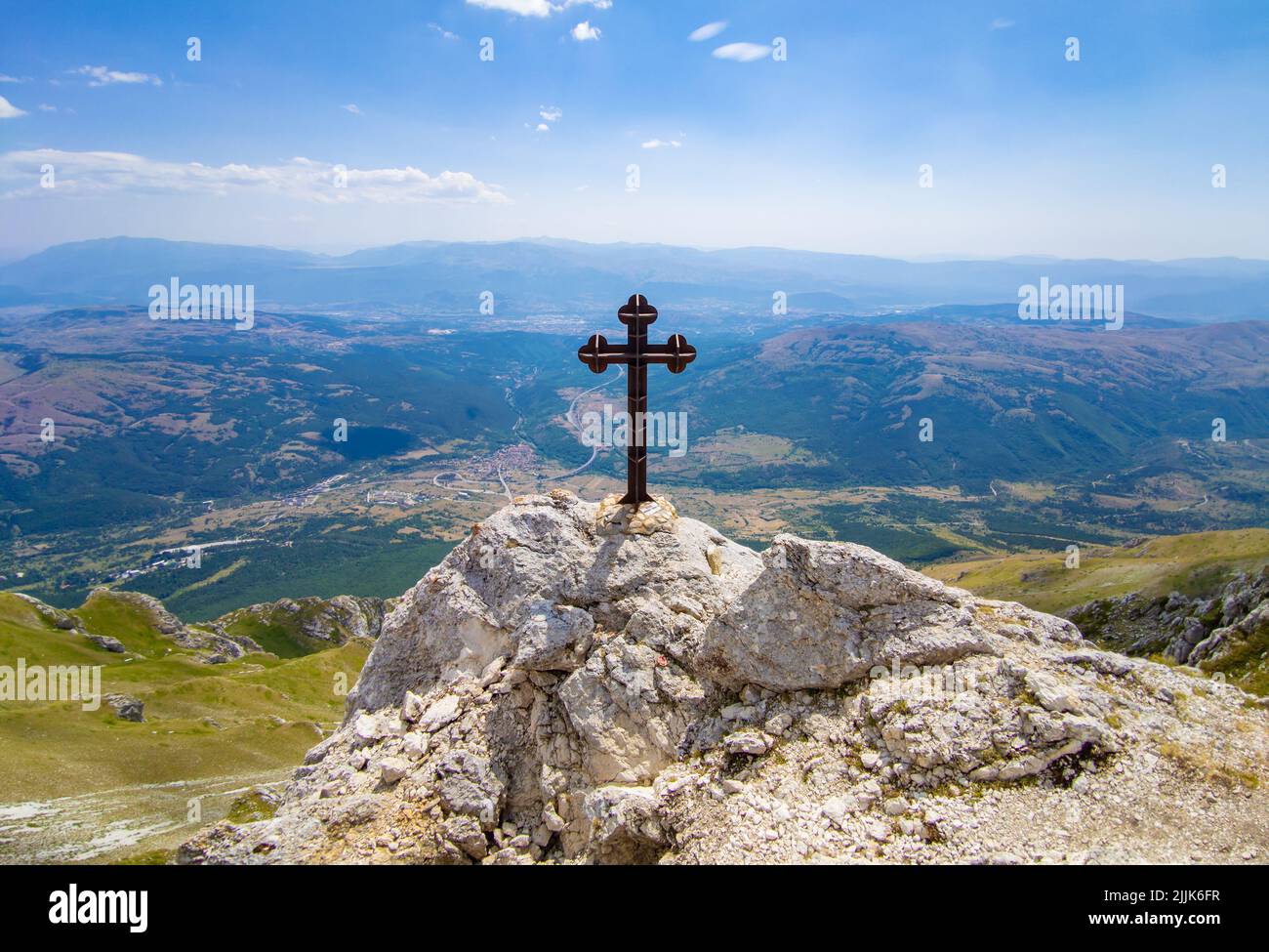 Cima delle Malecoste (Abruzzo, Italy) - A summit peak of the mountain range named Gran Sasso, with hiker who practice trekking at high altitude. Stock Photo