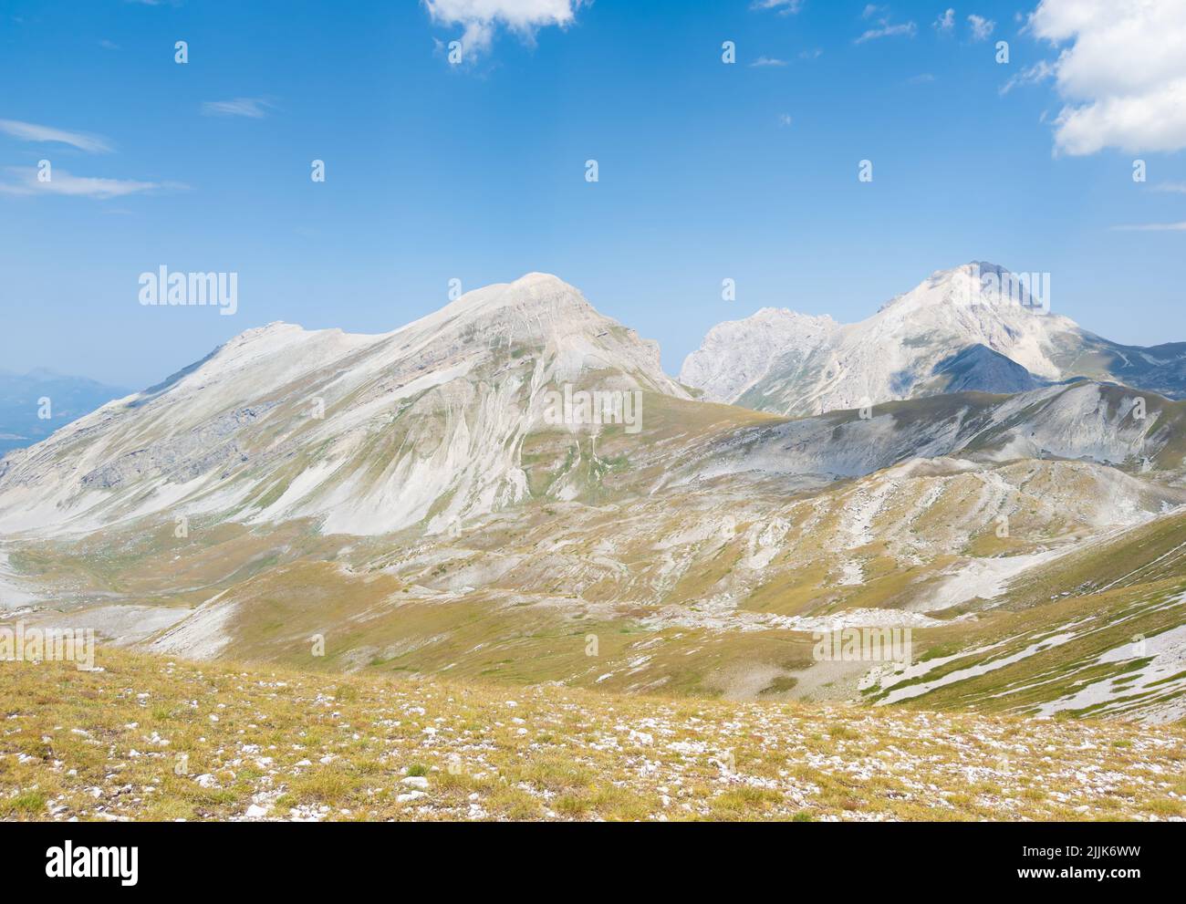 Cima delle Malecoste (Abruzzo, Italy) - A summit peak of the mountain range named Gran Sasso, with hiker who practice trekking at high altitude. Stock Photo
