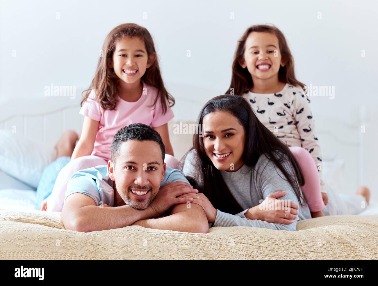 Your family is the best team youll ever have. a couple lying on bed