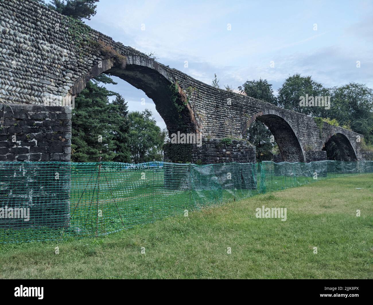 A closeup of the ruins of an ancient Roman bridge in Romagnano Sesia, Italy Stock Photo