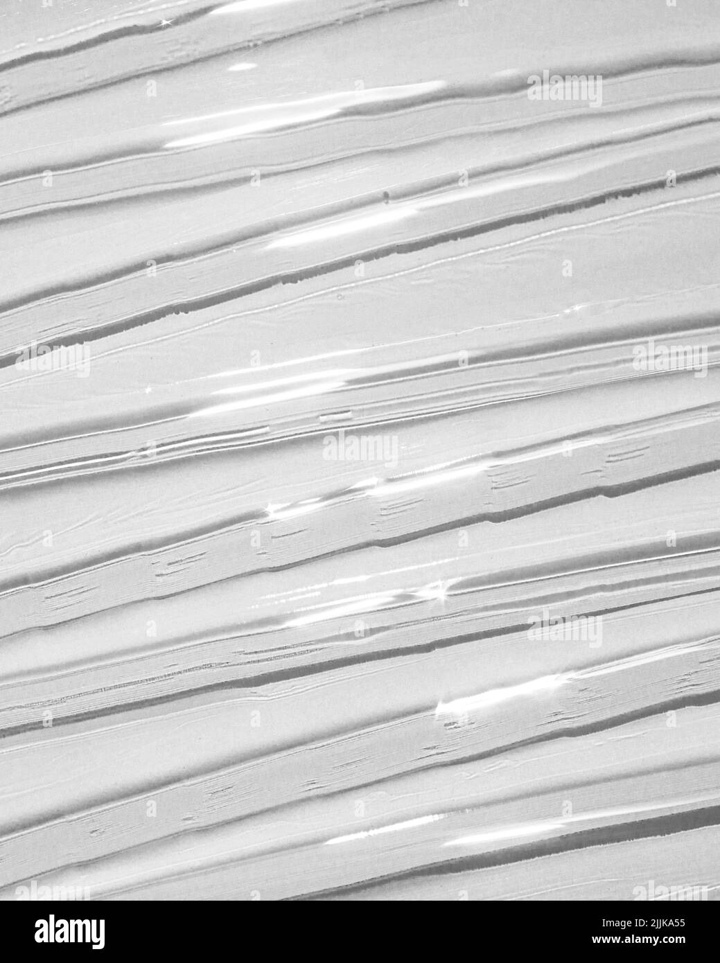 A closeup of a shiny face primer texture Stock Photo Alamy